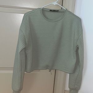 Pale green cropped sweatshirt